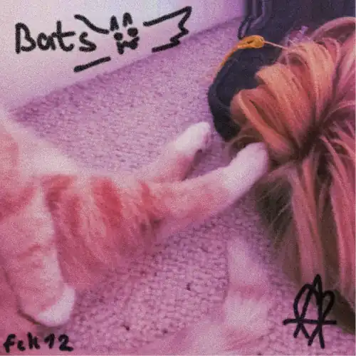 album cover of bats, it's me laying on the floor next to a cat, u can only see my hair